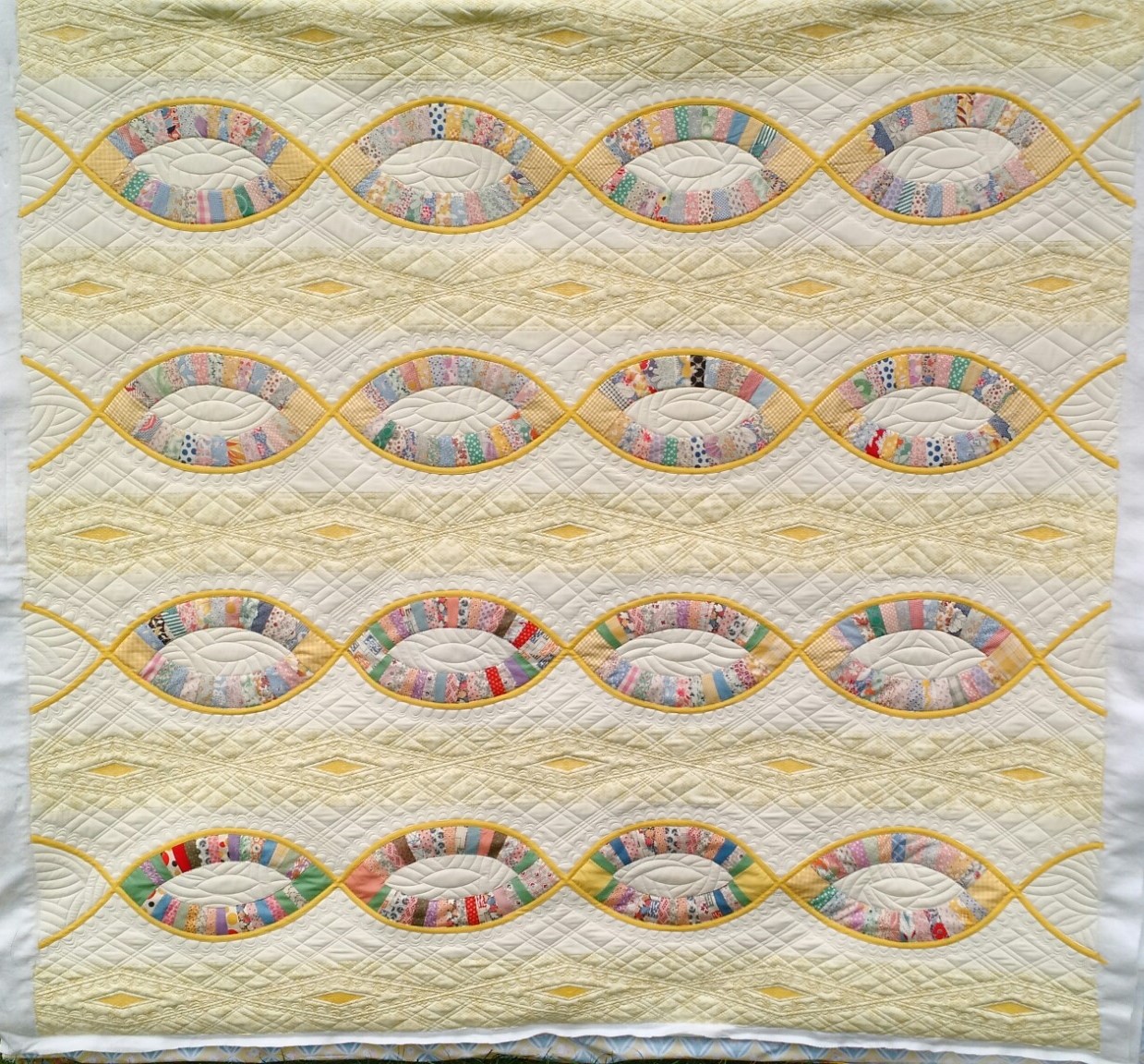 A Thousand Fibers Connect Us, By Victoria Findlay Wolfe, quilted by Mandy Leins, October 2015.