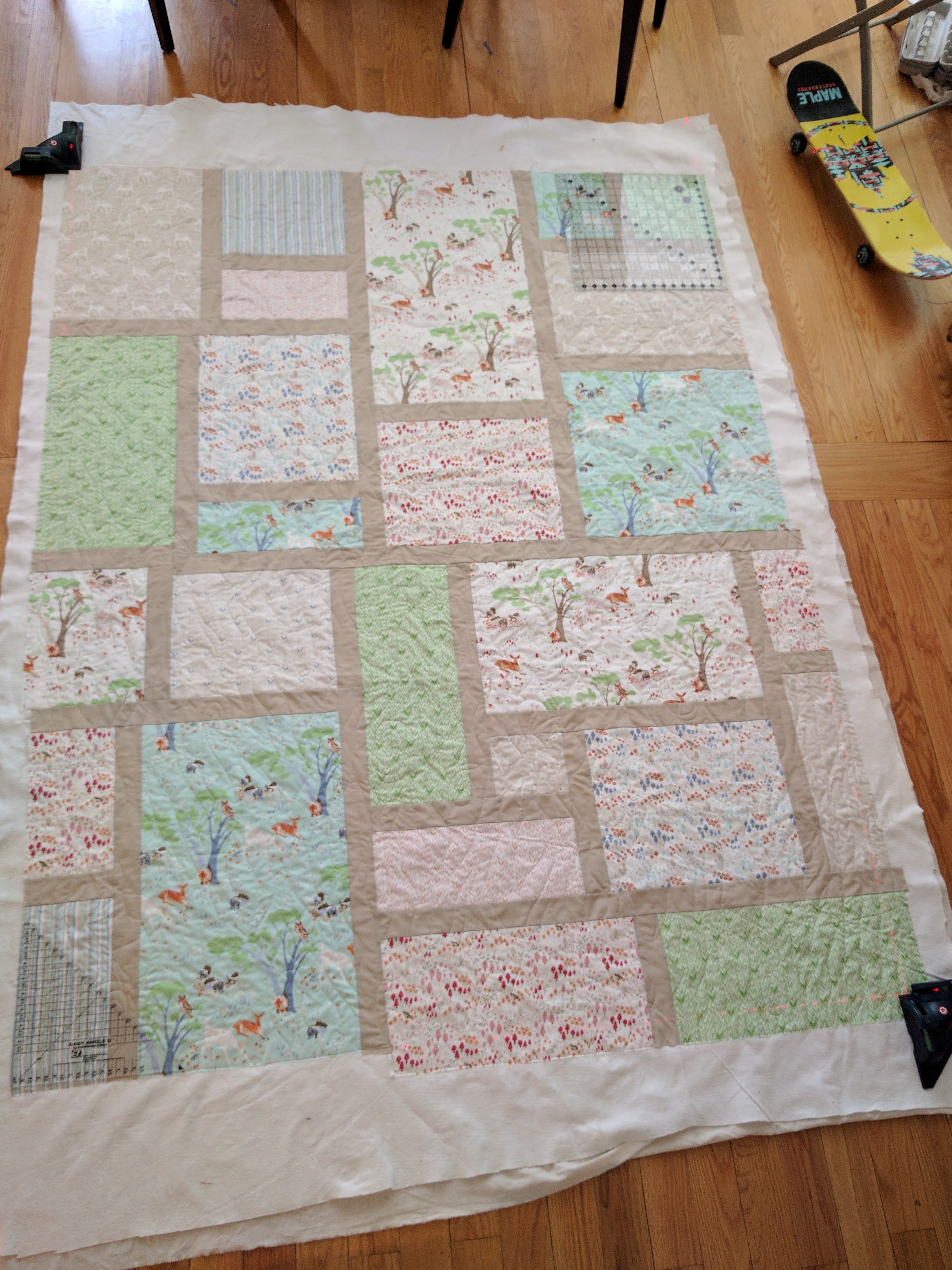 The corners WITHOUT lasers have the square-edged rulers in them. I try to get them so that they're where I think the corners should be, and since I know the first set of lasers is where I want them, I know at least one side of the corner will be ok.